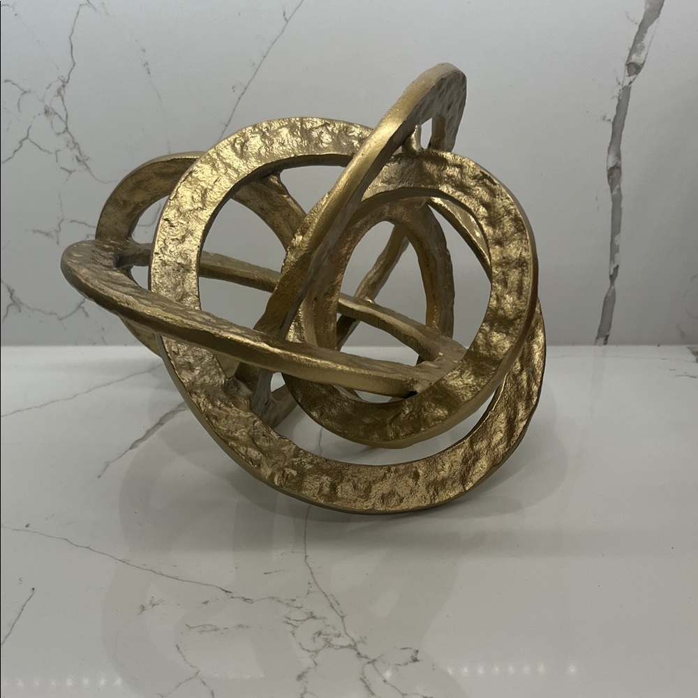 Elegant Gold Intertwined Sculpture
